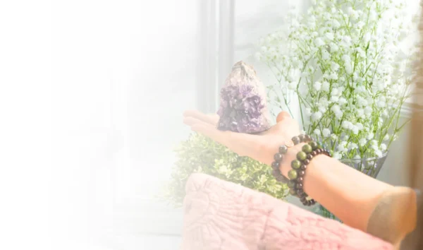 Hands radiating healing energy during a Reiki session, promoting relaxation, balance, and spiritual well-being.